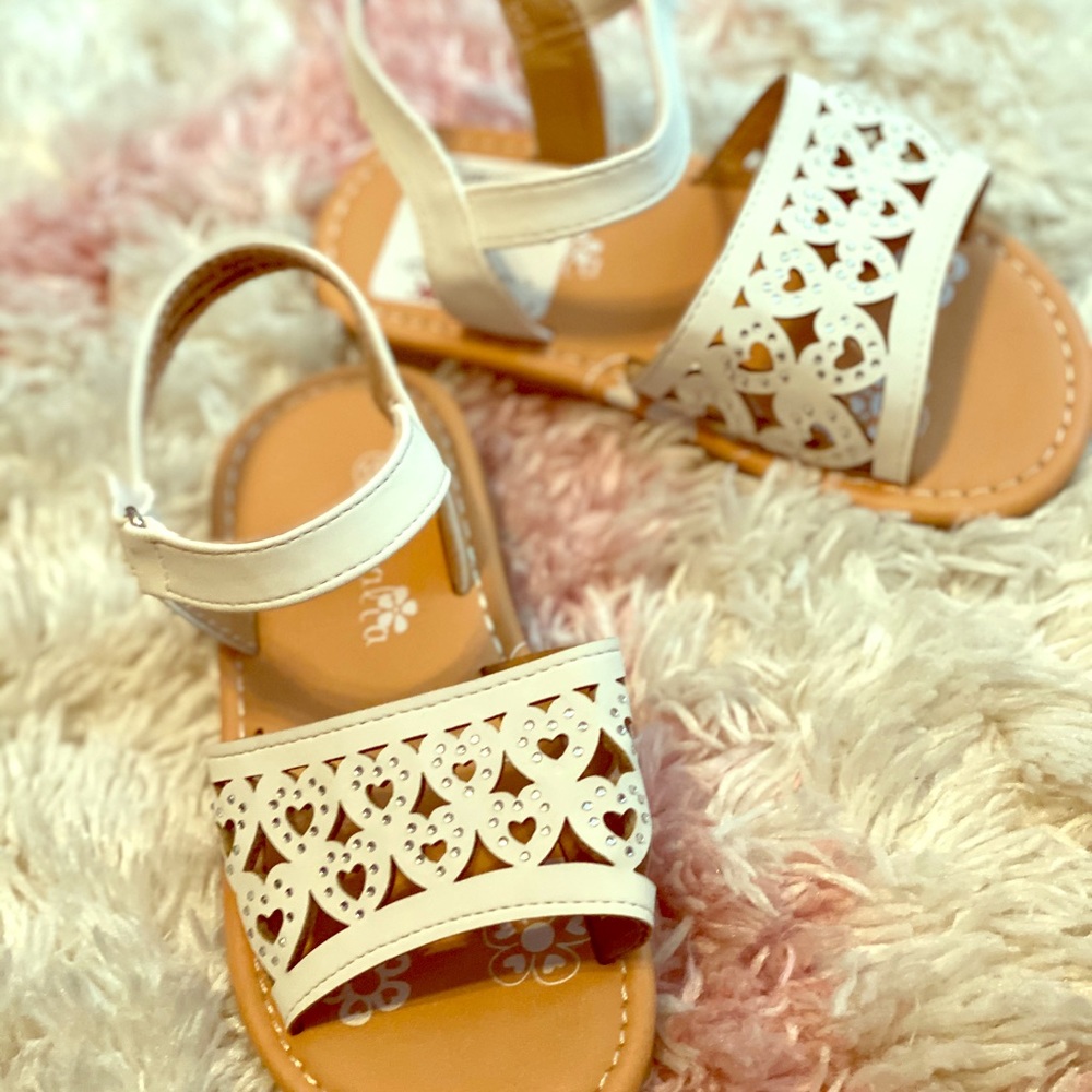 Little girls white sandals.